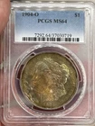 1904-O Morgan Silver Dollar – PCGS MS64 – "Exotic Rainbow Toning", must see