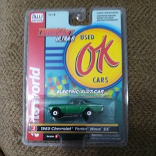 AUTO WORLD THUNDERJET SC377 1969 Chevrolet Nova SS green SLOT CAR