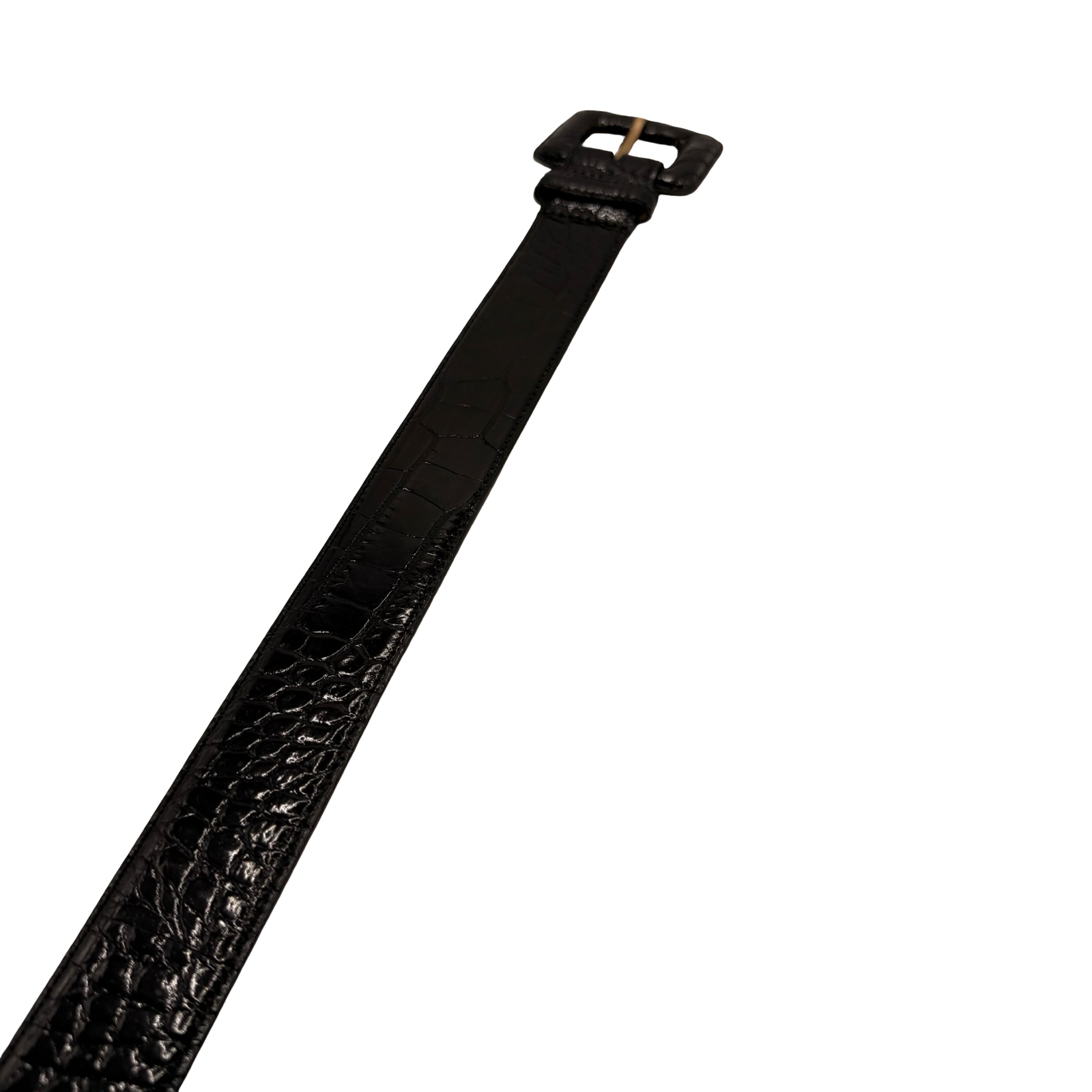 Black leather women's belt with intricate embossed alligator skin pattern, double buckle, and gold-tone hardware.