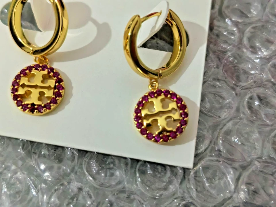 Pendientes TORY BURCH CRISTAL MORADO HUECO ORO LOGO Foto 2 de 3