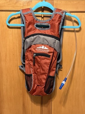 Northwest Territory Hydration Backpack w/ Bladder 2L New Hiking Ultrathon Orange