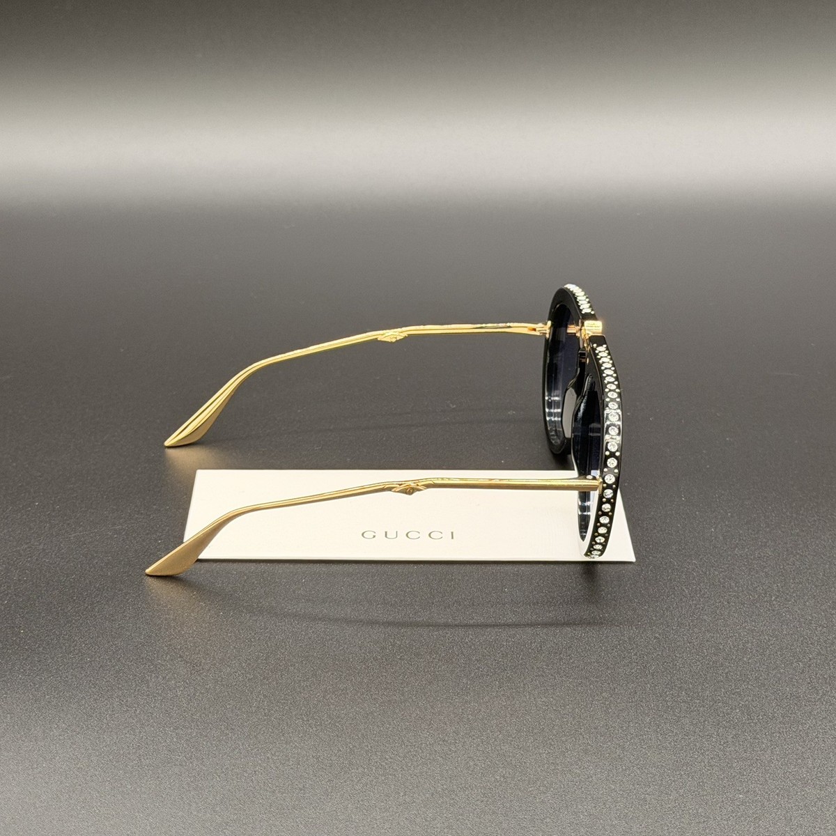 Gucci GG0307S 002 Foldable Sunglasses Black Crystal Blue Lens