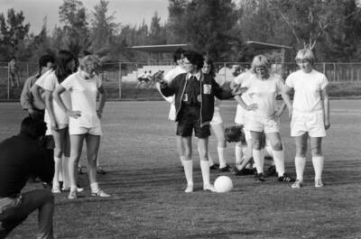 Members of England women's football team with coach Pat Dunn a tra- Old Photo