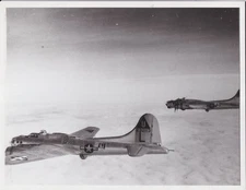 Boeing B-17G 42-2113 457 BG & another in formation photo