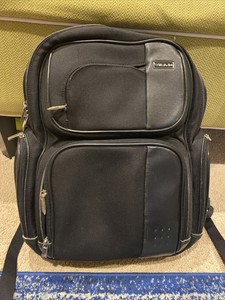 tumi black backpack