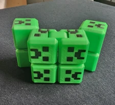 3d Printed multicolored Minecraft magic fidget cube.