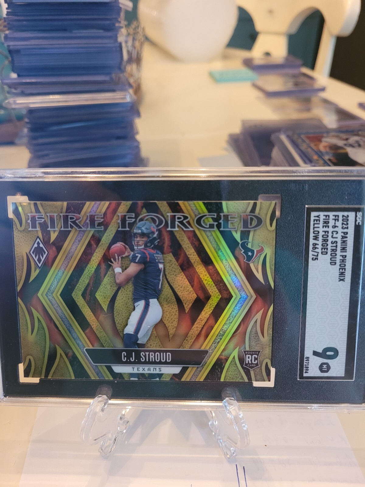 2023 Panini Phoenix SGC 9 - Fire Forged Yellow #FF-6 C.J. Stroud /75 (RC)