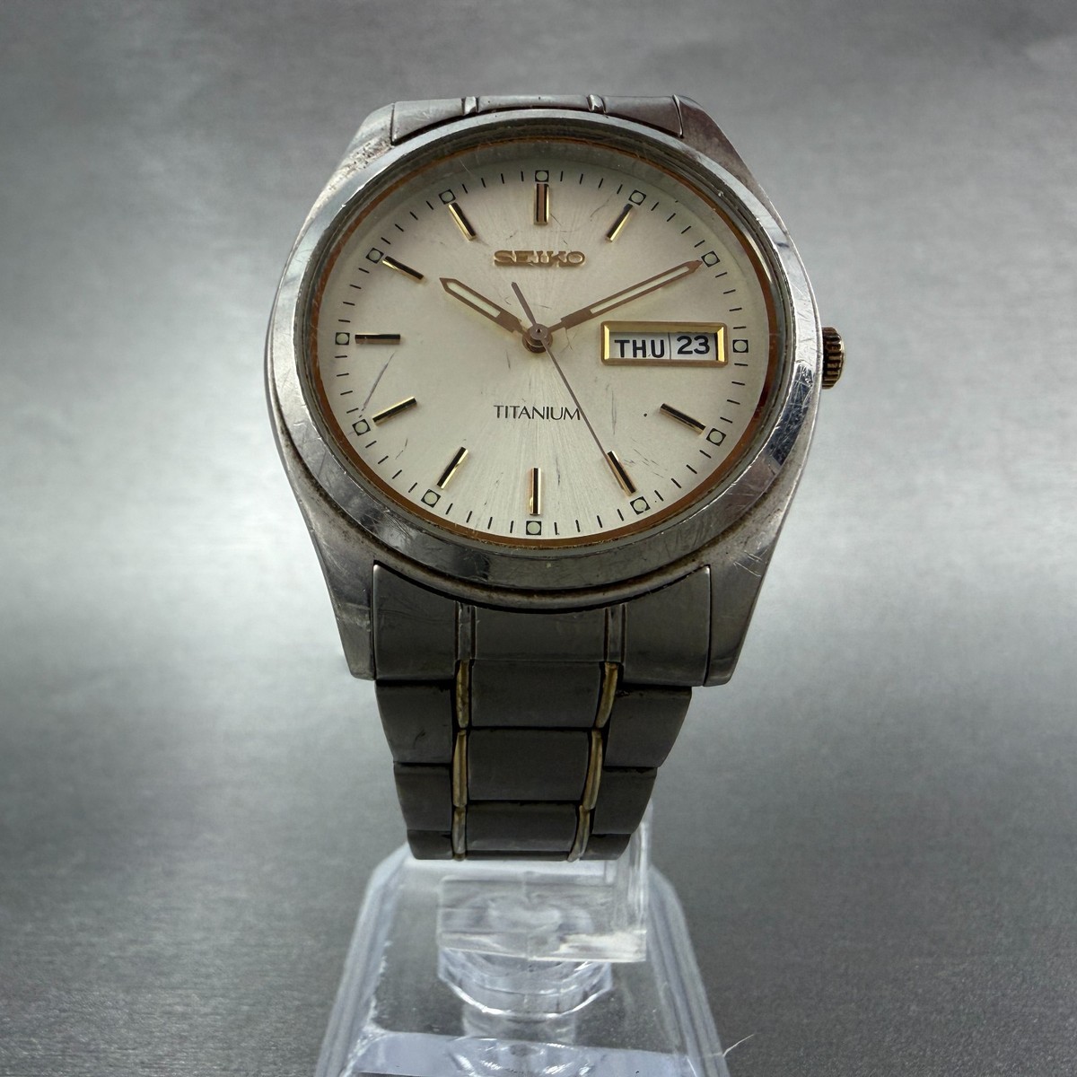 Seiko Watch Men 36mm Champagne Dial Two Tone Titanium Daydate 7N43