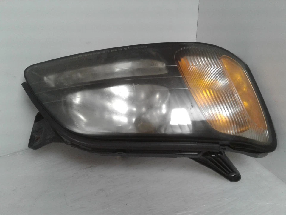 Conjunto de faros derechos usados se adapta a: Subaru Baja 2005 con barra horizontal negra derecha Foto 4 de 4