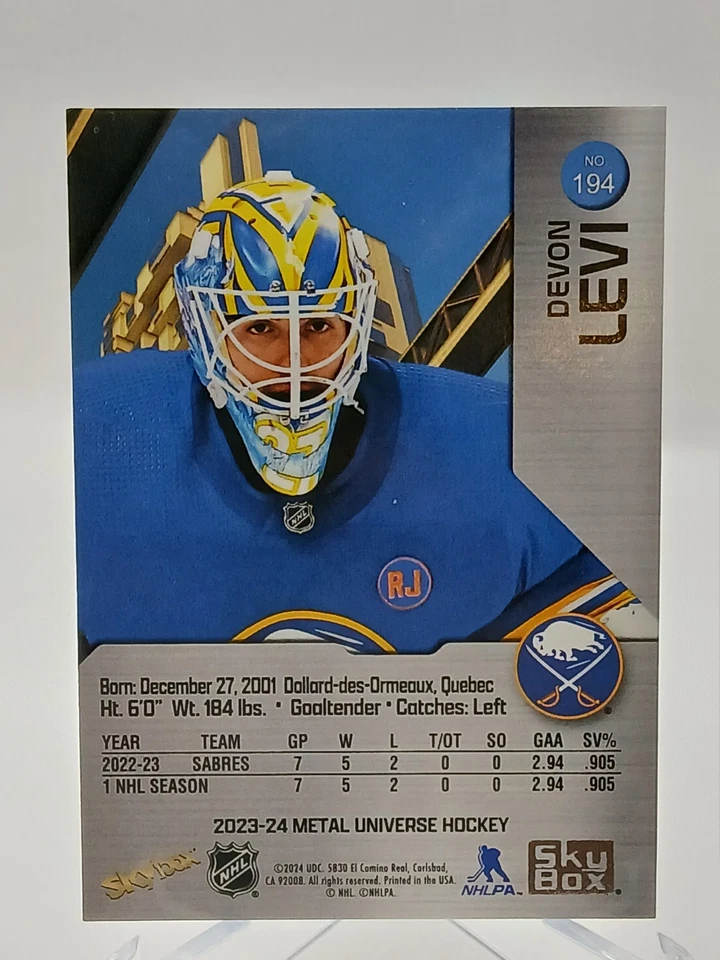 2023-24 SkyBox Metal Universe Hockey #194 Devon Levi Rookie – Buffalo Sabres RC! - Image 2 of 2