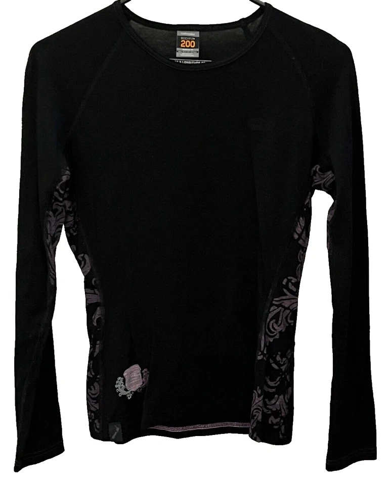 Top Icebreaker Bodyfit 200 para mujer pequeño cuello redondo negro púrpura geométrico Foto 2 de 4