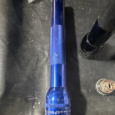 Mag-Lite Blue Flashlight with Spring and Battery Parts Shown
