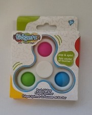FIDGETZ SPINNER Push N Pop sensory fun Spins while you pop NEW