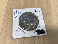 D. WASHINGTON 1972 QUARTER DOLLAR. LIBERTY IN GOD WE TRUST E PLURIBUS UNUM