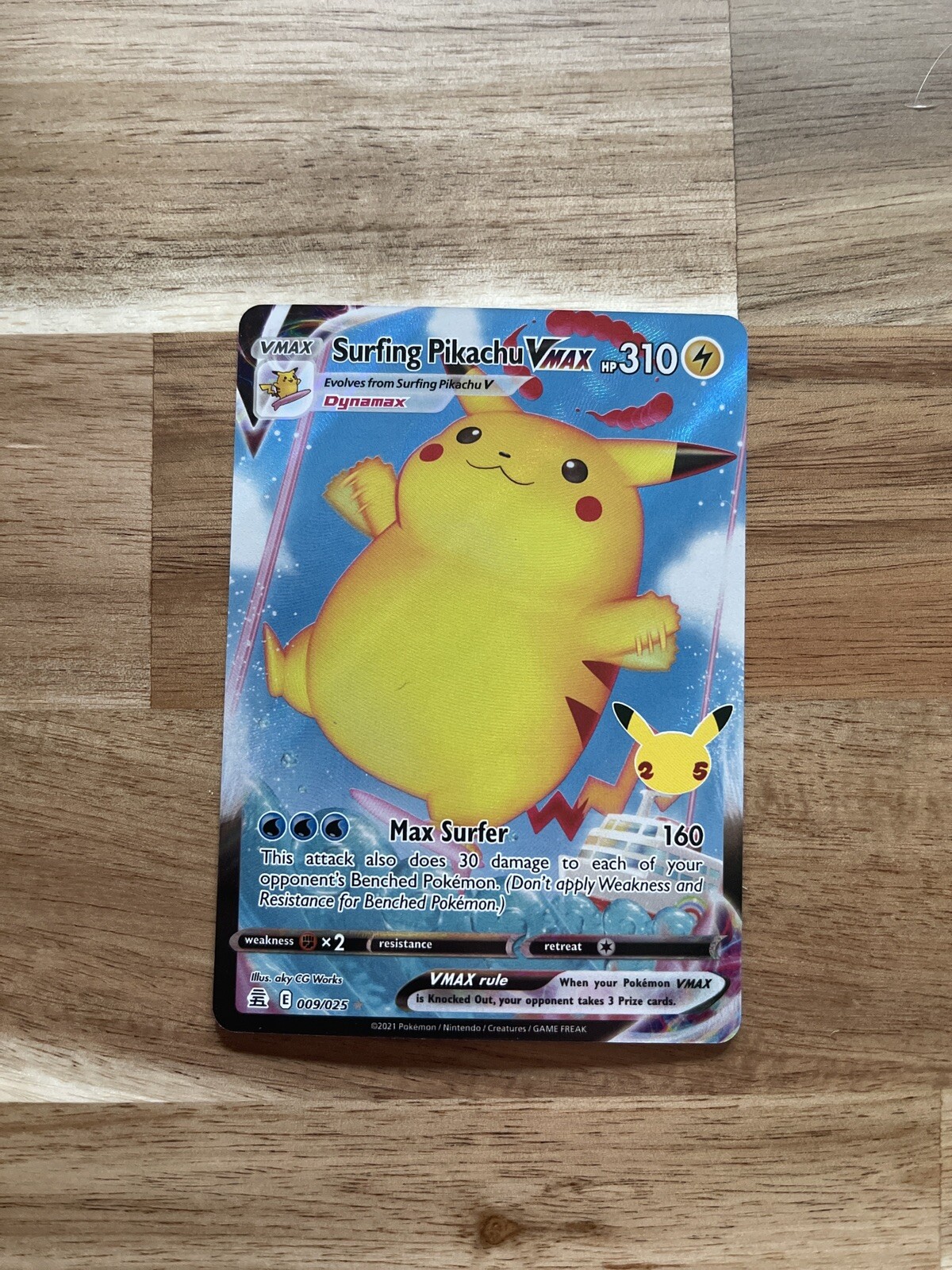 Surfing Pikachu VMAX 009/025 - Celebrations - Holo Pokemon Card Near Mint (NM)