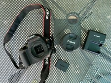 Canon EOS Rebel T100 DSLR Camera Kit w/18-55mm Lens  Hoya Glass Filter  Strap