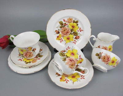 Royal Grafton Teeservice: Tassen, Teller, Milchkännchen, Zuckerdose. 2 Stk. Gelbe Blumen.
