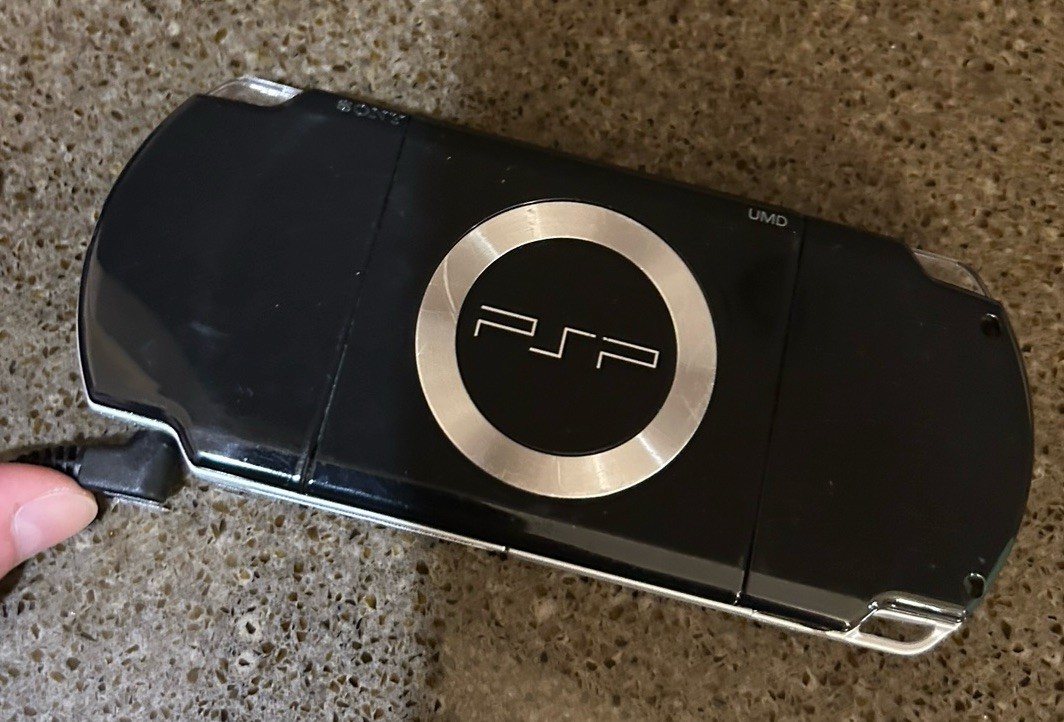 Sony PSP 2001 Console Bundle With Charger, Case, Car Charger 10 Games In Cases