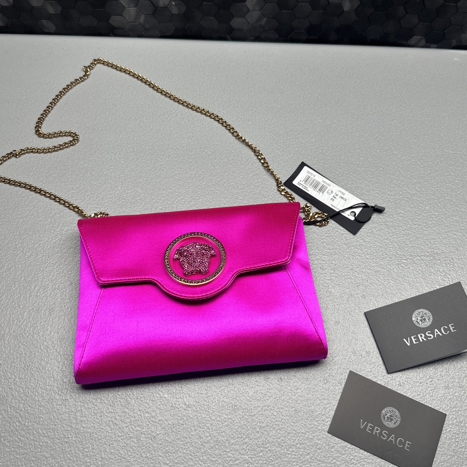 versace pink clutch