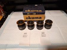 VINTAGE ( OKUMA ) EMPTY BOX & VARIOUS SPOOLS / OWNERS MANUALS/ SEE PHOTOS