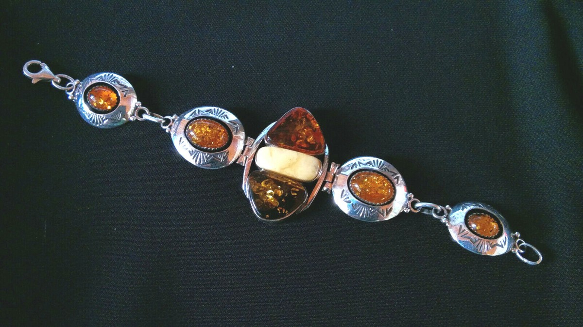 Arnold and Carleena Goodluck Navajo Sterling Silver and Amber