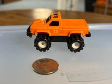 Schaper Stomper Orange Ford 4x4 Pickup