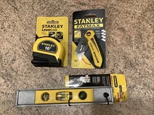 A three piece STANLEY handyman tool set: 16’ tape, FATMAX knife, magnetic level