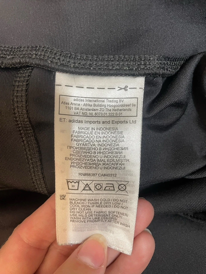 Chaleco acolchado con cremallera completa negro/rosa/blanco Puma para niñas talla M 10/12 Foto 2 de 4