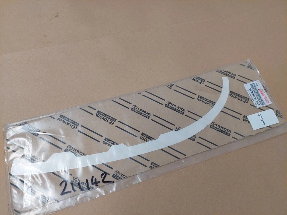 Protector panel puerta trasera izquierda Toyota Hilux MK8 678580K080 2016-2019 genuino Foto 2 de 4