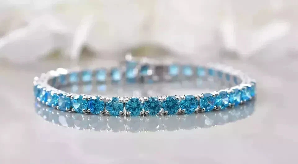 Brazalete tenis mujer 8 quilates corte redondo topacio azul simulado chapado en oro blanco 14 k Foto 3 de 3