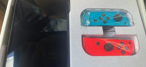 Nintendo Switch – OLED Model w/ Neon Red & Neon Blue Joy-Con