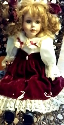 porcelain doll red velvet dress