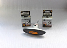 Klucz regulowany TaylorMade Club z 2 wymiennymi ciężarkami w pudełku.