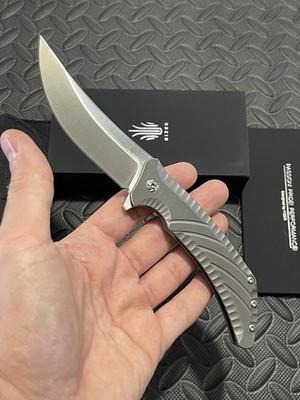 Kizer Knives - Nomad - Satin Titanium Scales w/ a S35VN Blade.