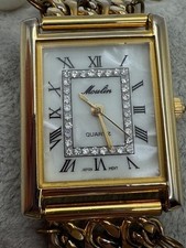 Ladies Moulin Mother of Pearl Crystal Accent Dial Gold Tone Pearl Band Watch