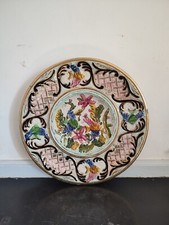 Grand plat en faïence signé