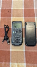 Texas Instrument TI-89 Titanium Graphing Calculator With USB Programming Cable
