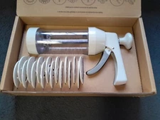 The Pampered Chef 1525 Easy Grip Cookie Press with 16 Cookies Design Disks