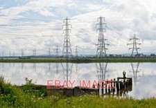 FOTO RÍO ADELANTE EN ALLOA RESTOS DEL PUERTO EN ALLOA Y PILONES LLEVANDO