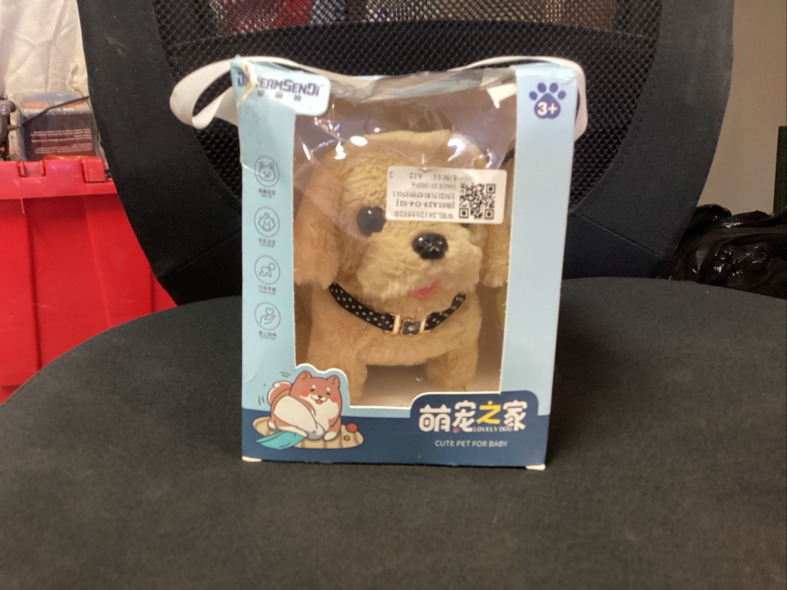 Plush motion activated dog toy for babies still in box