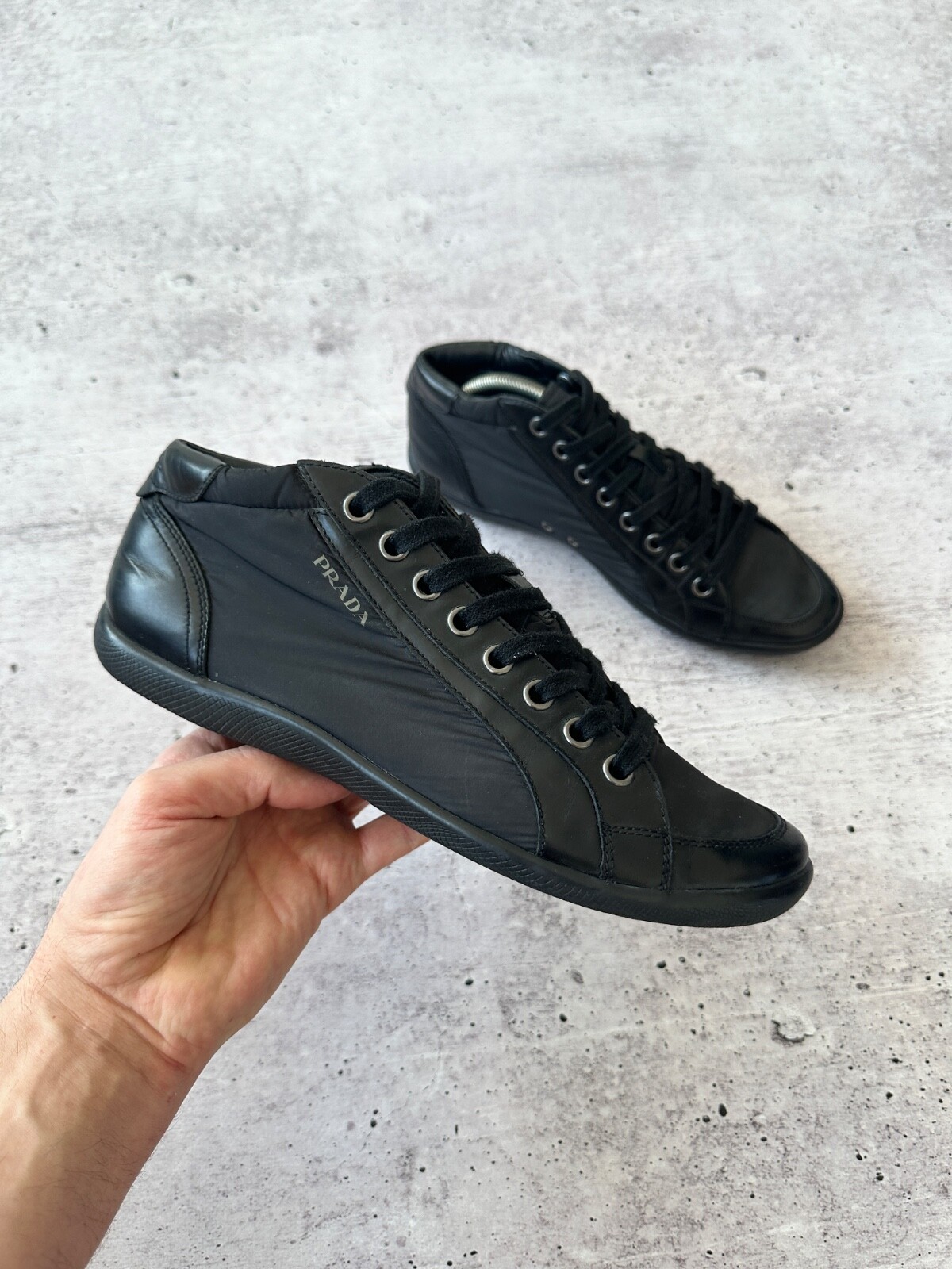 Prada sport low top sneakers in nylon and leather with lace-up design  