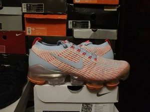 blue and orange vapormax flyknit
