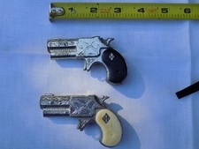 Lot 2 1960  s Derringer Toy Cap Guns White  Black Handles, Hubley Halco, read