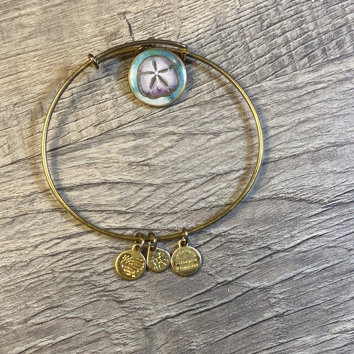 Alex and Ani Sand Dollar Bracelet “Faith Brings Miracles” Gold