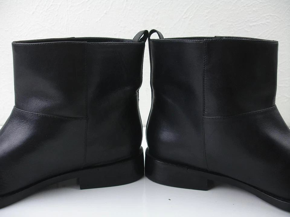 Botas Chelsea de cuero negras sin cordones al tobillo 8,5 38,5 $595 THEYSKENS THEORY para mujer Foto 2 de 4