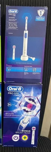 Cepillo de dientes eléctrico genuino Oral B Pro 570 Braun 3D blanco con 2 cabezales de recarga - Imagen 5 de 7