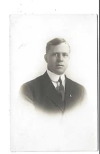 POSTCARD RPPC SERIOUS YOUNG MAN DRESSED IN SUIT 7 TIE