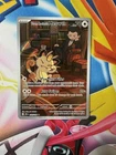 Pokémon TCG Team Rockets Meowth Card 203/182 Destined Rivals