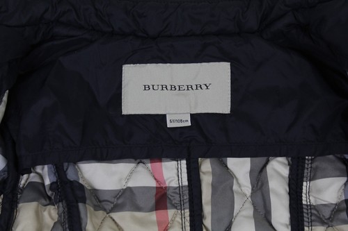 Chaqueta acolchada Burberry azul marino para niñas de 5 años ligera con cremallera - Imagen 10 de 13