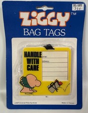 Vintage 1981 ZIGGY Luggage Bag Tags Plastic Handle With Care Yellow NOS Vintage 1981 ZIGGY Luggage Bag Tags Plastic Handle With Care Yellow NOS